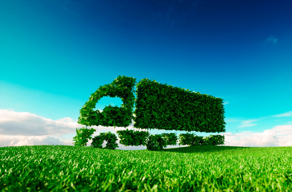 Camión de transporte hecho con hojas representa la logística verde